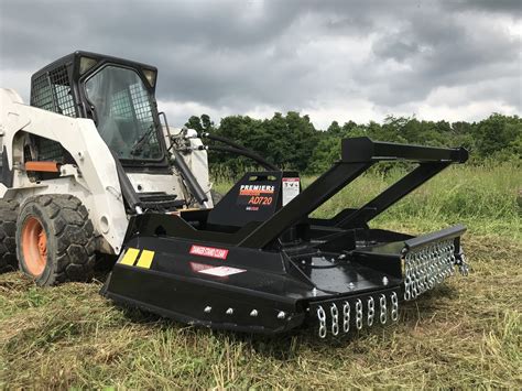 clearing brush with a skid steer|skid steer grinder attachment.